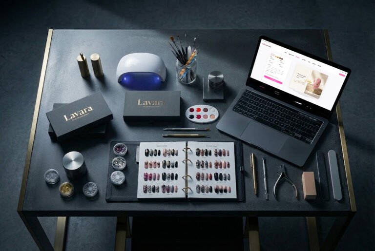 Flat lay of a nail business plan with private label press-on nail boxes and color charts.