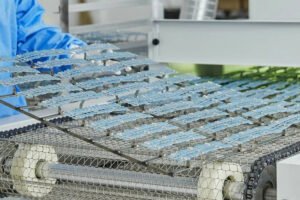 High-speed automated conveyor belt system for mass manufacturing of press-on nails to ensure fast lead time.